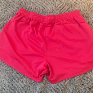 Pink Nike shorts